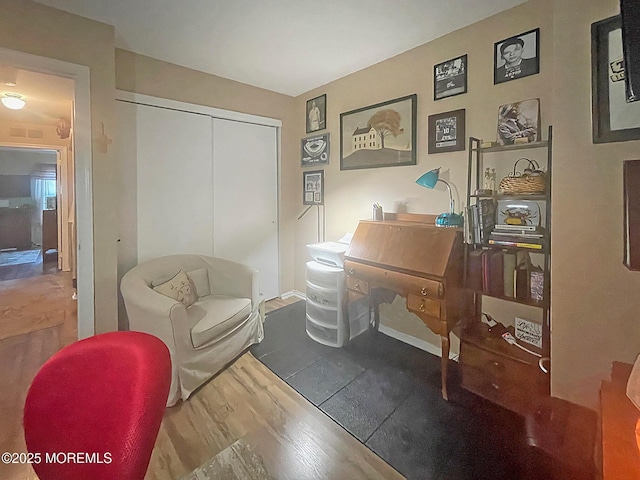 69 Bradford Ct, Aberdeen, NJ 07747 - sitting room featuring wood finished floors and baseboards