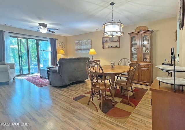 69 Bradford Ct, Aberdeen, NJ 07747 - dining room featuring wood finished floors and a ceiling fan