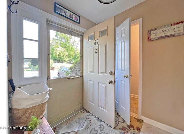 69 Bradford Ct, Aberdeen, NJ 07747 - foyer entrance featuring baseboards