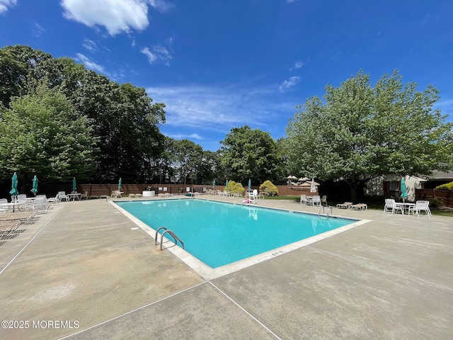 69 Bradford Ct, Aberdeen, NJ 07747 - community pool with a patio