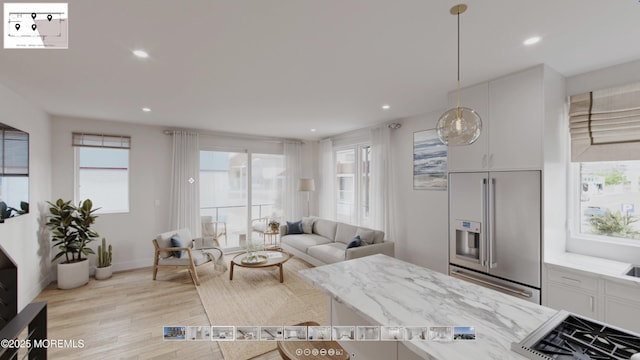 500 Ocean Ter Unit 1, Seaside Heights, NJ 08751 - living area featuring light wood-style floors, healthy amount of natural light, recessed lighting, and baseboards
