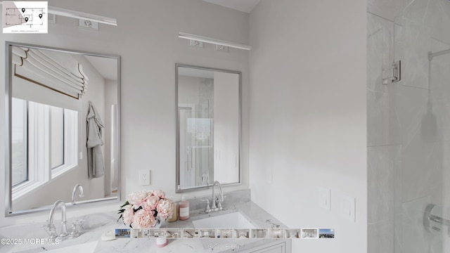500 Ocean Ter Unit 1, Seaside Heights, NJ 08751 - bathroom featuring double vanity and a stall shower