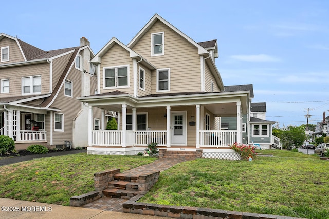 300 Lareine Ave, Bradley Beach, NJ 07720 - view of front facade with covered porch and a front yard