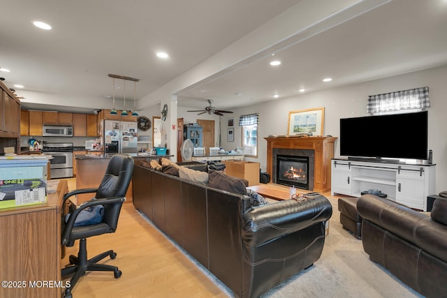 300 Lareine Ave, Bradley Beach, NJ 07720 - living room with a glass covered fireplace, light wood-type flooring, recessed lighting, and ceiling fan