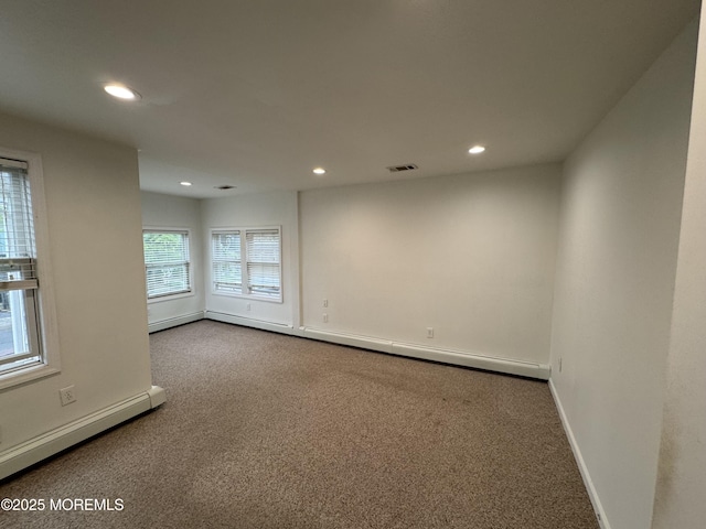 300 Lareine Ave, Bradley Beach, NJ 07720 - unfurnished room featuring a baseboard heating unit, dark carpet, and recessed lighting