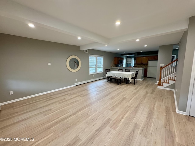 300 Lareine Ave, Bradley Beach, NJ 07720 - dining area featuring a baseboard heating unit, recessed lighting, beam ceiling, light wood-style flooring, and stairs