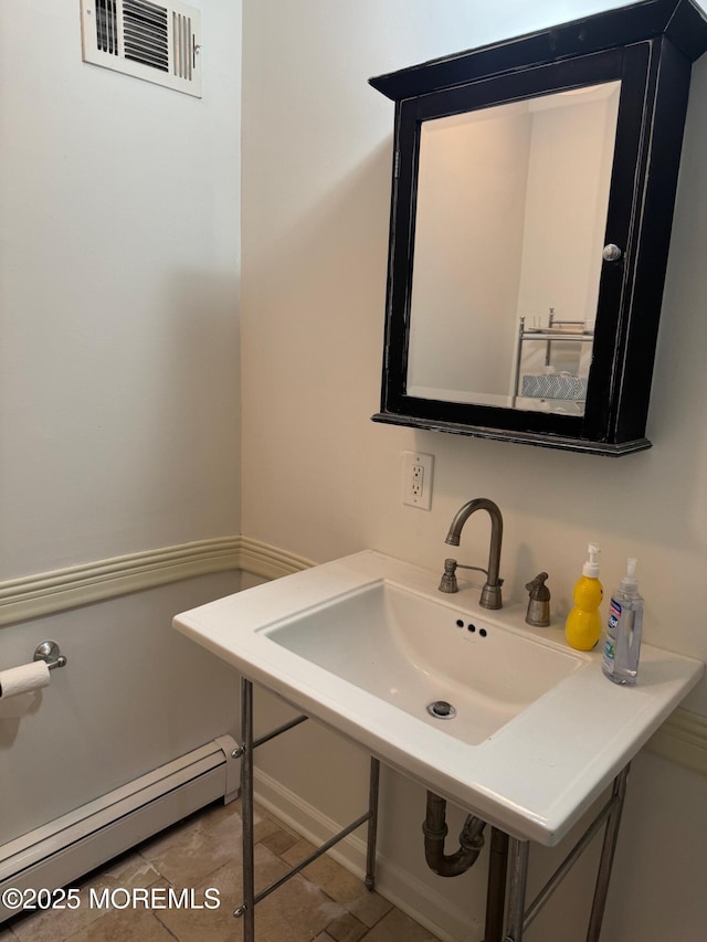 300 Lareine Ave, Bradley Beach, NJ 07720 - bathroom featuring baseboard heating and tile patterned floors