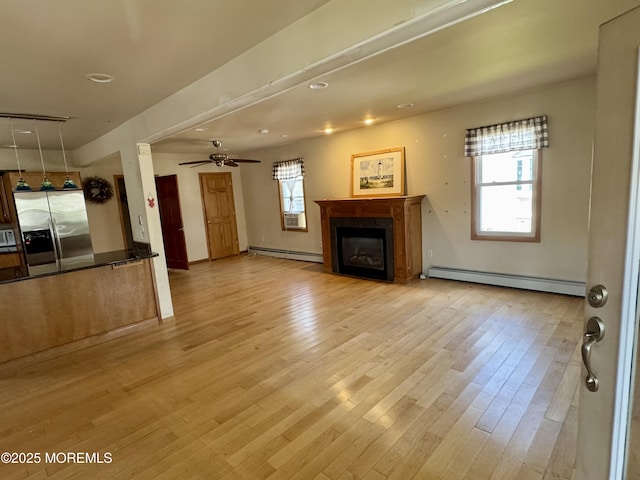300 Lareine Ave, Bradley Beach, NJ 07720 - unfurnished living room featuring a baseboard radiator, a fireplace, light wood-style flooring, a ceiling fan, and recessed lighting