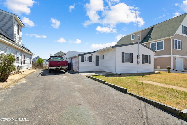 131 S Commodore Dr, Little Egg Harbor, NJ 08087 - view of front of home with driveway and a front lawn