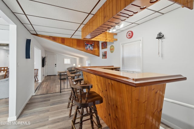 131 S Commodore Dr, Little Egg Harbor, NJ 08087 - indoor bar featuring a drop ceiling, wood finished floors, and baseboards