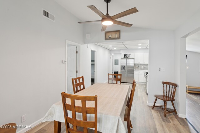 131 S Commodore Dr, Little Egg Harbor, NJ 08087 - dining area featuring light wood-style floors, a ceiling fan, recessed lighting, baseboards, and a towering ceiling