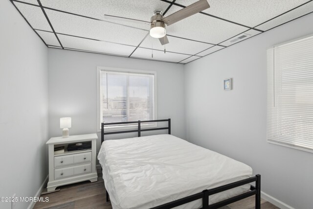 131 S Commodore Dr, Little Egg Harbor, NJ 08087 - bedroom featuring a paneled ceiling, dark wood-style flooring, baseboards, and ceiling fan