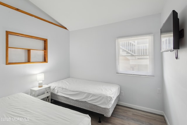 131 S Commodore Dr, Little Egg Harbor, NJ 08087 - bedroom featuring wood finished floors, vaulted ceiling, and baseboards