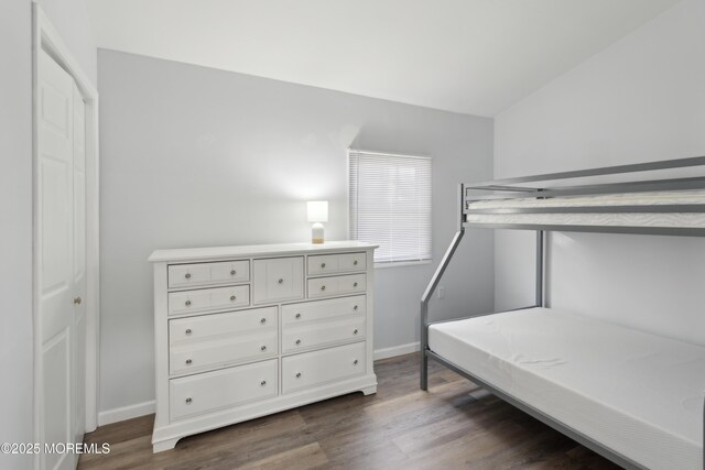 131 S Commodore Dr, Little Egg Harbor, NJ 08087 - bedroom featuring baseboards and dark wood finished floors