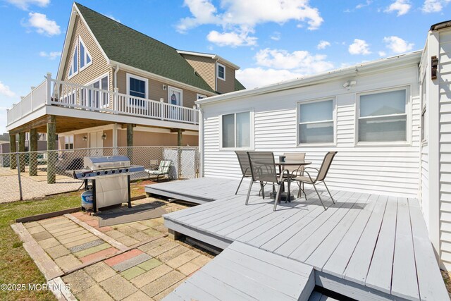 131 S Commodore Dr, Little Egg Harbor, NJ 08087 - deck with outdoor dining space, a grill, and a patio area