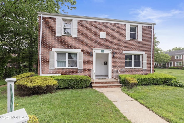 317 Bath Ave Unit 2, Long Branch, NJ 07740 - view of front of house with a front lawn and brick siding