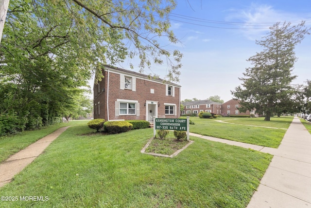 317 Bath Ave Unit 2, Long Branch, NJ 07740 - view of front of property featuring brick siding and a front yard