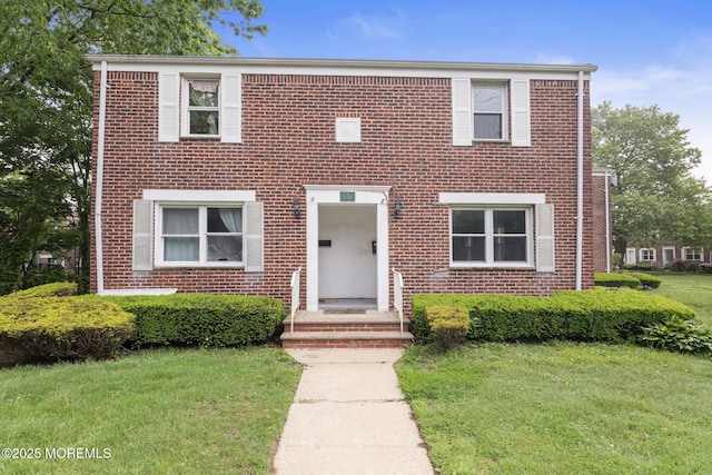 317 Bath Ave Unit 2, Long Branch, NJ 07740 - view of front of home with a front lawn and brick siding