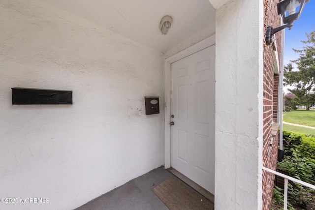 317 Bath Ave Unit 2, Long Branch, NJ 07740 - doorway to property with stucco siding