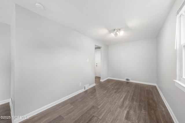 317 Bath Ave Unit 2, Long Branch, NJ 07740 - unfurnished room with dark wood-style floors and baseboards