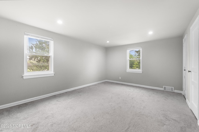 317 Bath Ave Unit 2, Long Branch, NJ 07740 - empty room with healthy amount of natural light, recessed lighting, carpet flooring, and baseboards