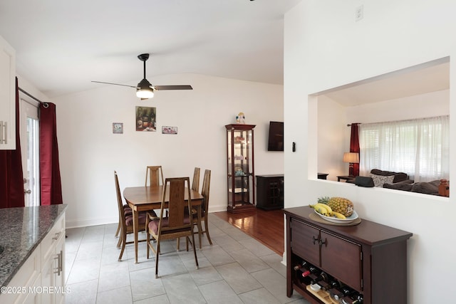 1117 Ruby Dr, Toms River, NJ 08753 - dining space featuring vaulted ceiling, ceiling fan, and light tile patterned floors