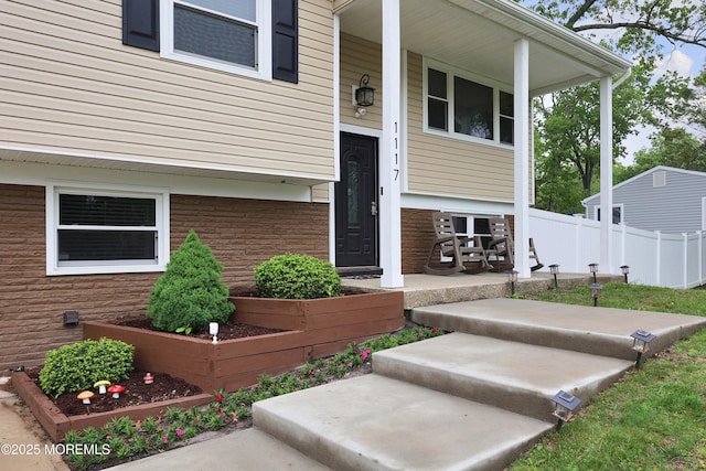 1117 Ruby Dr, Toms River, NJ 08753 - property entrance featuring a porch and stone siding