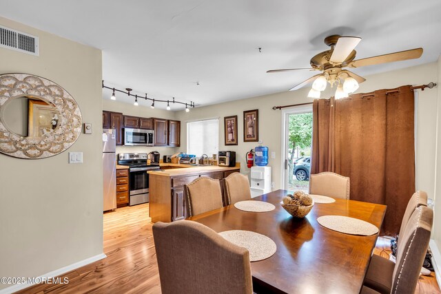 846 Winchester Ct Unit A, Manchester, NJ 08759 - dining area featuring light wood-style flooring, a ceiling fan, baseboards, and track lighting