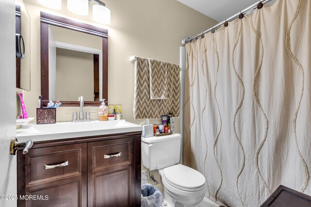 846 Winchester Ct Unit A, Manchester, NJ 08759 - bathroom featuring toilet, vanity, and a shower with shower curtain