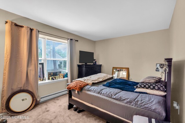 846 Winchester Ct Unit A, Manchester, NJ 08759 - bedroom with a baseboard heating unit and carpet