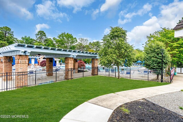 846 Winchester Ct Unit A, Manchester, NJ 08759 - view of property's community with a pergola and a pool