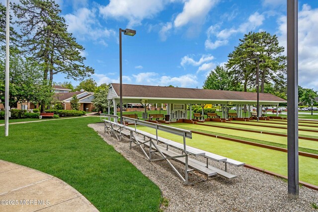 846 Winchester Ct Unit A, Manchester, NJ 08759 - surrounding community with a game area and a lawn