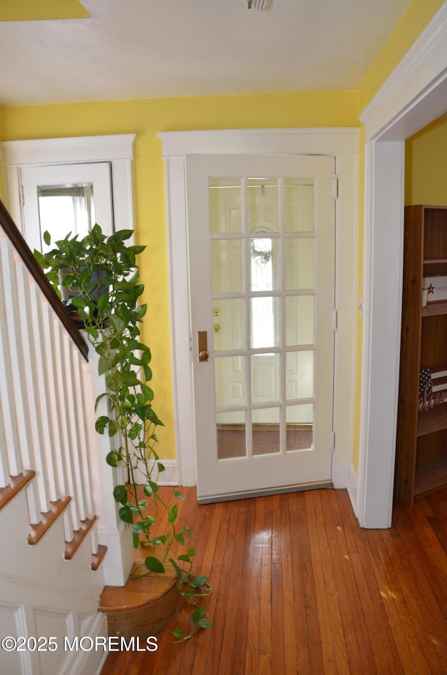 619 Leland Ave, Plainfield, NJ 07062 - entryway featuring stairway and hardwood / wood-style flooring