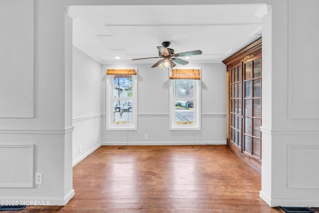 208 Cedar St, Lakehurst, NJ 08733 - spare room with wood-type flooring, ceiling fan, baseboards, and ornamental molding