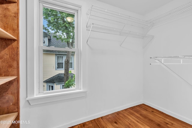 208 Cedar St, Lakehurst, NJ 08733 - walk in closet with wood finished floors