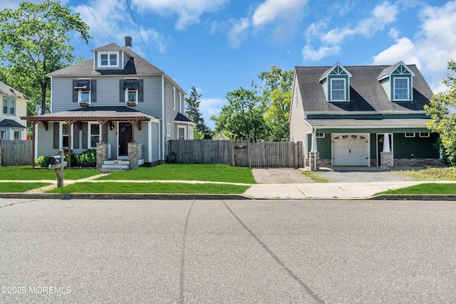 208 Cedar St, Lakehurst, NJ 08733 - view of front of home featuring driveway, stone siding, and a gate