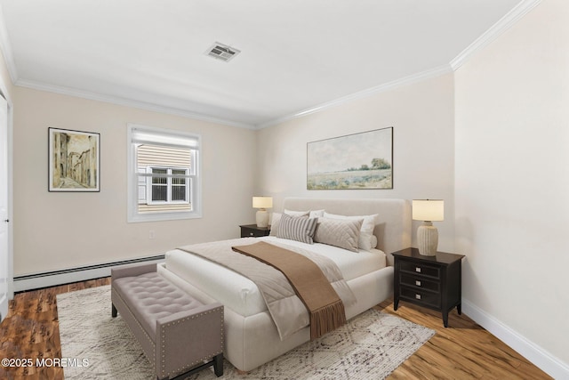 40 Prince Charles Dr, Toms River, NJ 08757 - bedroom featuring ornamental molding, wood finished floors, baseboards, and a baseboard radiator