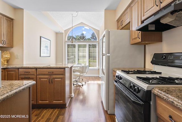 6 Rumford Ct, Jackson, NJ 08527 - kitchen with range with gas cooktop, under cabinet range hood, dark wood-type flooring, vaulted ceiling, and brown cabinetry