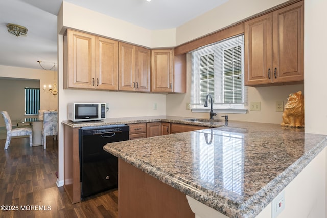 6 Rumford Ct, Jackson, NJ 08527 - kitchen featuring dishwasher, a sink, a peninsula, dark wood-style flooring, and stone countertops