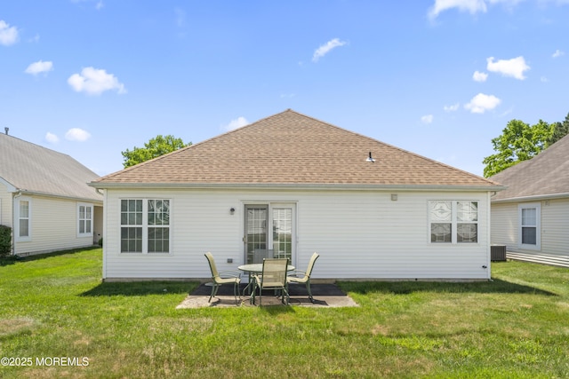 6 Rumford Ct, Jackson, NJ 08527 - back of property featuring a lawn, a patio area, central air condition unit, and roof with shingles