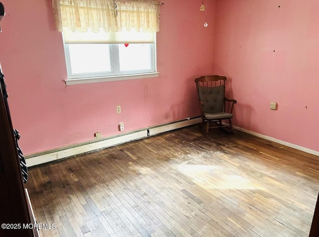 15 Mount Logan Ln, Toms River, NJ 08753 - empty room with a baseboard radiator, hardwood / wood-style floors, and baseboards