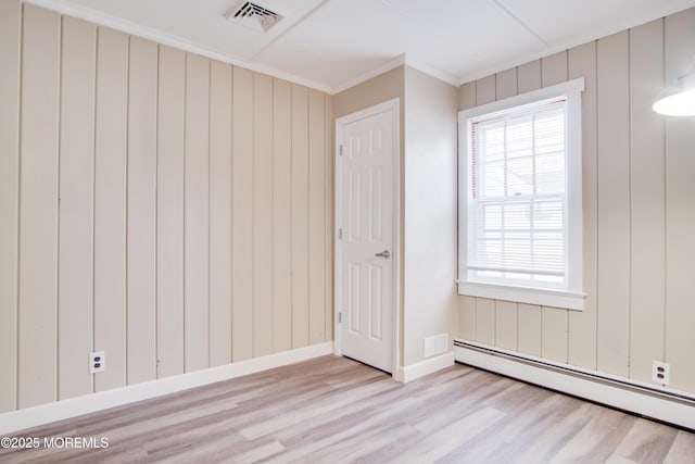 112 Bash Rd, Toms River, NJ 08753 - empty room featuring baseboard heating, light wood-type flooring, crown molding, and baseboards