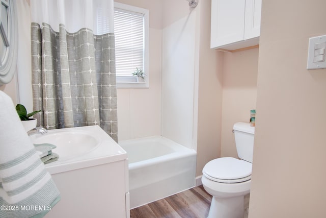 112 Bash Rd, Toms River, NJ 08753 - bathroom with vanity, toilet, wood finished floors, and washtub / shower combination