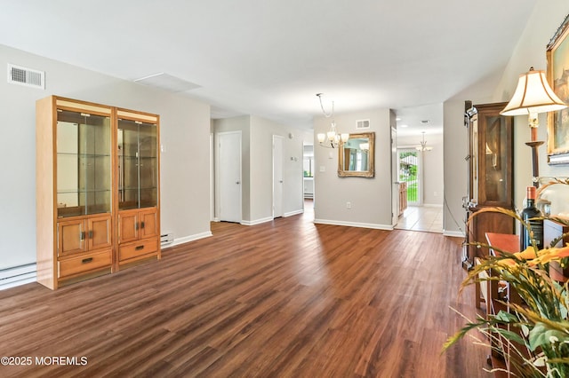47 Wild Turkey Way Unit E, Manalapan, NJ 07726 - unfurnished living room with a chandelier, dark wood-style floors, baseboards, and baseboard heating