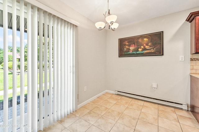 47 Wild Turkey Way Unit E, Manalapan, NJ 07726 - unfurnished dining area featuring a baseboard radiator, a chandelier, light tile patterned flooring, and baseboards