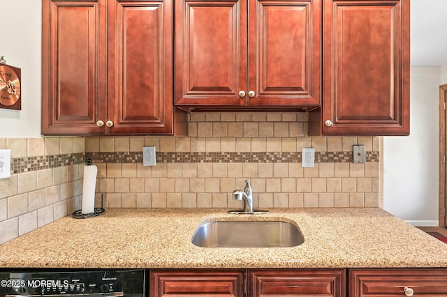 47 Wild Turkey Way Unit E, Manalapan, NJ 07726 - kitchen featuring reddish brown cabinets, a sink, dishwasher, and tasteful backsplash