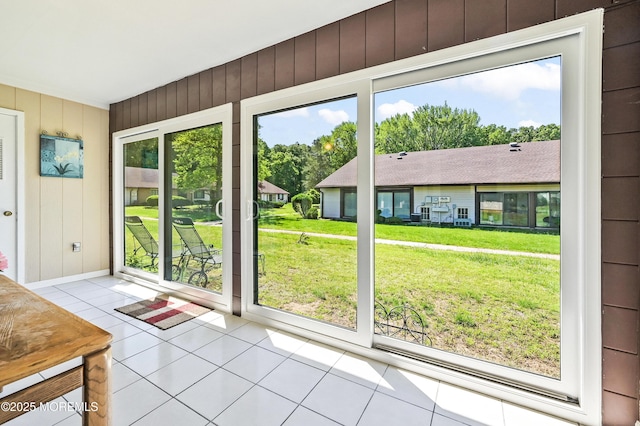 47 Wild Turkey Way Unit E, Manalapan, NJ 07726 - entryway featuring tile patterned flooring, wood walls, and baseboards