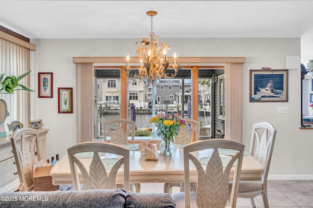 773 Princeton Ave, Brick, NJ 08724 - dining space with a chandelier, tile patterned floors, and baseboards