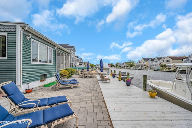 773 Princeton Ave, Brick, NJ 08724 - view of patio / terrace featuring a boat dock and a water view