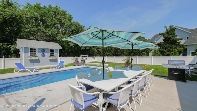 24 Woodview Ln, Cape May Court House, NJ 08210 - view of pool with a patio area, a fenced backyard, an outdoor structure, and outdoor dining area